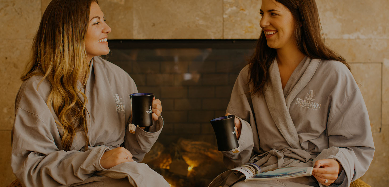 women in spa robes