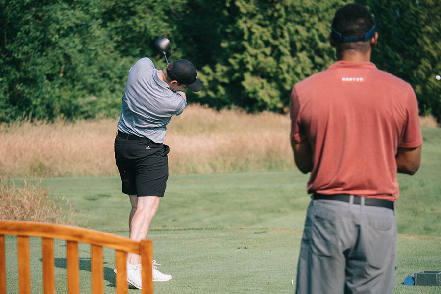 men playing golf