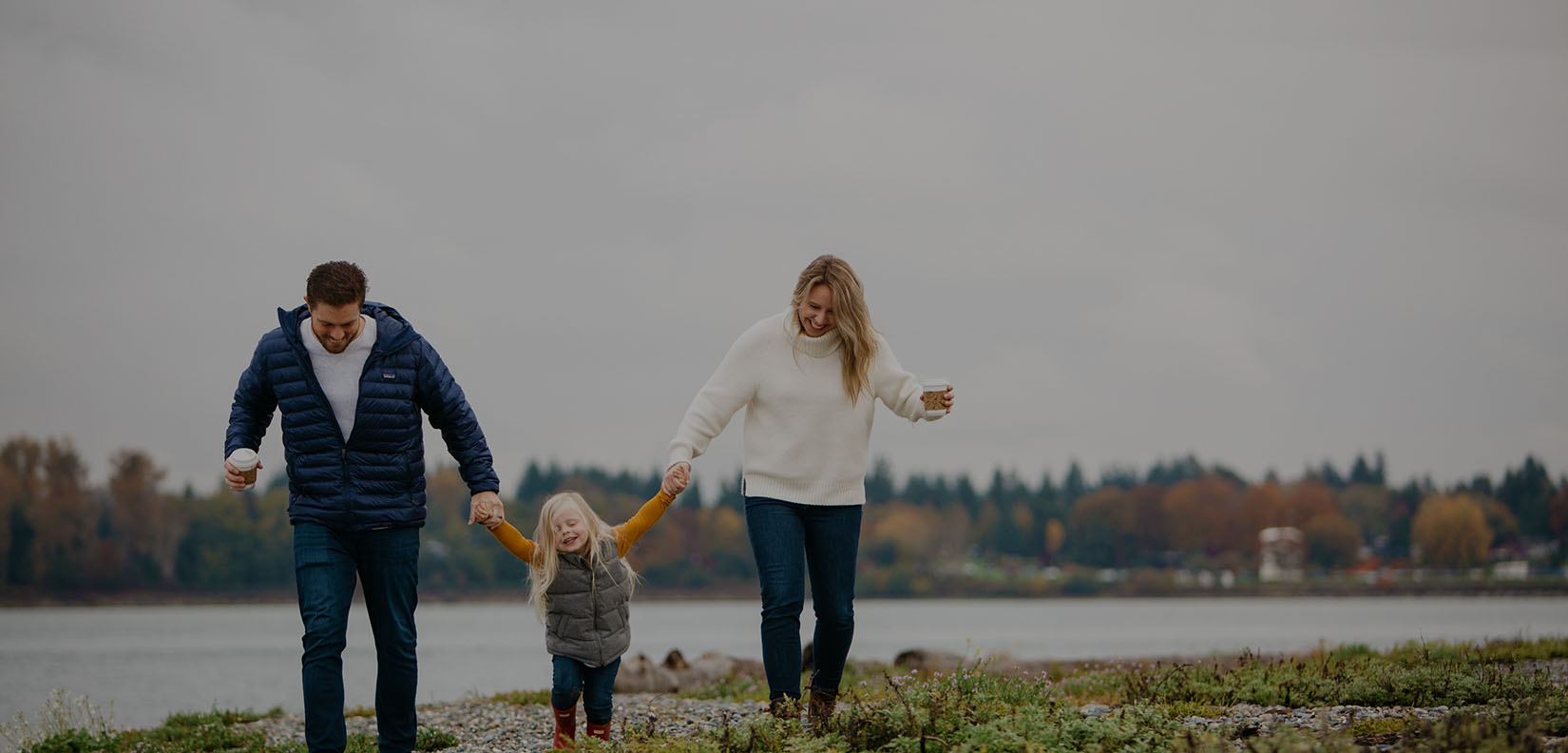 family walking on the beach